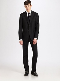 A sleek, sophisticated design tailored in luxurious virgin wool. Dry Clean. Made in Italy.JACKETTwo-button frontNotched lapelSide ventsFront flap pocketsFour button detail at cuffPANTFlat front, belt loopsFront slash pocketsUnfinished hem A sleek, sophisticated design tailored in luxurious virgin wool. Dry Clean. Made in Italy.JACKETTwo-button frontNotched lapelSide ventsFront flap pocketsFour button detail at cuffPANTFlat front, belt loopsFront slash pocketsUnfinished hem