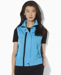 Designed from lightweight microfiber in a bold, bright hue, Lauren by Ralph Lauren's stylish vest features a ventilating mesh interior and sleek hardware for a chic active look. Designed from lightweight microfiber in a bold, bright hue, Lauren by Ralph Lauren's stylish vest features a ventilating mesh interior and sleek hardware for a chic active look.