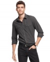 With a sleek fit and a stylish heathered design, you can get down with this Kenneth Cole New York button down.