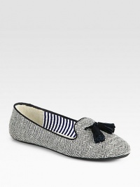 An English-inspired design, handcrafted of traditional wool herringbone with lush suede tassels. Wool herringbone upper with suede tasselsLeather liningRubber solePadded insoleImportedThis style runs true to size. We recommend ordering your usual size for a standard fit. An English-inspired design, handcrafted of traditional wool herringbone with lush suede tassels. Wool herringbone upper with suede tasselsLeather liningRubber solePadded insoleImportedThis style runs true to size. We recommend ordering your usual size for a standard fit.