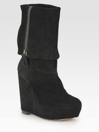 An urban-cool suede design with an exposed zipper, foldover shape and commanding wedge. Self-covered wedge, 5 (125mm)Covered platform, 1¼ (30mm)Compares to a 3¾ heel (95mm)Shaft, 8Leg circumference, 12Suede upperSide zipLeather solePadded insoleImported An urban-cool suede design with an exposed zipper, foldover shape and commanding wedge. Self-covered wedge, 5 (125mm)Covered platform, 1¼ (30mm)Compares to a 3¾ heel (95mm)Shaft, 8Leg circumference, 12Suede upperSide zipLeather solePadded insoleImported