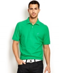 A classic polo from Nautica crafted in soft Pima cotton. With allover basic colors and an embroidered logo at chest, it's a go-to shirt you'll want in every color. A classic polo from Nautica crafted in soft Pima cotton. With allover basic colors and an embroidered logo at chest, it's a go-to shirt you'll want in every color.