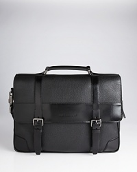 Built to tote all of your work materials in style, this pebbled leather briefcase is unmistakably Burberry with a sleek, structured design that is as functional as it is fashionable. Built to tote all of your work materials in style, this pebbled leather briefcase is unmistakably Burberry with a sleek, structured design that is as functional as it is fashionable.