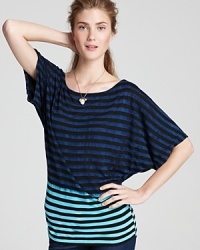 A cool dip-dye pattern and stripes come together on this Michael Stars tee, cut in a slouchy-chic silhouette with dolman sleeves. A cool dip-dye pattern and stripes come together on this Michael Stars tee, cut in a slouchy-chic silhouette with dolman sleeves.