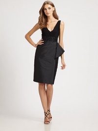 The little black dress doesn't get better than this with shirred point d'esprit bodice, beaded waist and slim taffeta skirt.Deep V neckline, front and backBeaded waistbandAsymmetric pleating on skirtBack waist dartsConcealed back zipperBack ventLinedNylon bodicePolyester skirtDry cleanImportedModel shown is 5'11 (180cm) wearing US size 4. The little black dress doesn't get better than this with shirred point d'esprit bodice, beaded waist and slim taffeta skirt.Deep V neckline, front and backBeaded waistbandAsymmetric pleating on skirtBack waist dartsConcealed back zipperBack ventLinedNylon bodicePolyester skirtDry cleanImportedModel shown is 5'11 (180cm) wearing US size 4.