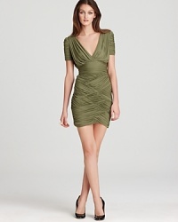 Gorgeously draped silk jersey creates a divine silhouette on this ultra-modern Halston Heritage dress. Gorgeously draped silk jersey creates a divine silhouette on this ultra-modern Halston Heritage dress.