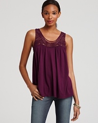 A crochet inset at the neckline lends eclecticism to this richly hued Michael Stars tank. A crochet inset at the neckline lends eclecticism to this richly hued Michael Stars tank.