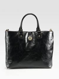 Buttery soft leather crafted in a roomy logo-embellished silhouette.Double top handles, 5½ dropRemovable adjustable shoulder strap, 15-26 dropMagnetic top closureProtective metal feetOne inside zip pocketTwo inside open pocketsCotton lining16½W X 11½H X 4½DImported Buttery soft leather crafted in a roomy logo-embellished silhouette.Double top handles, 5½ dropRemovable adjustable shoulder strap, 15-26 dropMagnetic top closureProtective metal feetOne inside zip pocketTwo inside open pocketsCotton lining16½W X 11½H X 4½DImported