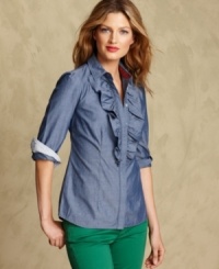 Tommy Hilfiger's chambray shirt is both laid-back and feminine in versatile chambray denim with an oversized ruffle at the neckline. Tommy Hilfiger's chambray shirt is both laid-back and feminine in versatile chambray denim with an oversized ruffle at the neckline.