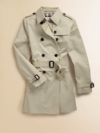 This chic double-breasted silhouette features traditional trench styling and a checked cotton lining.Point collarButton epaulettesButton-down gunflapDouble-breasted button frontLong sleeves with belted cuffsSelf beltRainflapBack ventCottonCotton liningMachine washImported