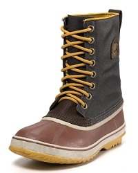 This rugged all-weather boot from Sorel keeps you warm and dry under any conditions, featuring a rubber shell toe and sides, waterproof leather and canvas upper and tough rubber sole. This rugged all-weather boot from Sorel keeps you warm and dry under any conditions, featuring a rubber shell toe and sides, waterproof leather and canvas upper and tough rubber sole.