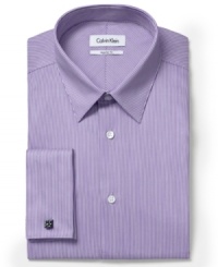Stripes give you solid style and confidence for any high-pressure day with this sharp dress shirt from Calvin Klein. Stripes give you solid style and confidence for any high-pressure day with this sharp dress shirt from Calvin Klein.