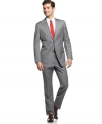 In sleek gray, this Tommy Hilfiger suit gives your dress wardrobe an modern update. In sleek gray, this Tommy Hilfiger suit gives your dress wardrobe an modern update.