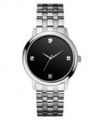 Sophistication never goes out of style: a handsome, diamond-accented watch by GUESS.