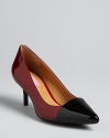Check off all the shoe style boxes with these pointed toe, cap toe pumps from Isaac Mizrahi New York.