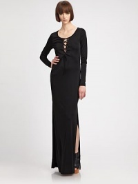 A fierce, comfortable design featuring a sexy lace-up front and discreet side slit. Scoopneck with plunging lace-up frontLong sleevesSide slitAbout 45 from natural waist70% modal/30% cuproDry cleanMade in USA of imported fabricModel shown is 5'10.5 (179cm) wearing US size Small. A fierce, comfortable design featuring a sexy lace-up front and discreet side slit. Scoopneck with plunging lace-up frontLong sleevesSide slitAbout 45 from natural waist70% modal/30% cuproDry cleanMade in USA of imported fabricModel shown is 5'10.5 (179cm) wearing US size Small.