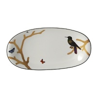 Embellished with a nature-inspired motif, this porcelain relish dish from Bernardaud brings an elegantly fanciful look to your table. Embellished with a nature-inspired motif, this porcelain relish dish from Bernardaud brings an elegantly fanciful look to your table.