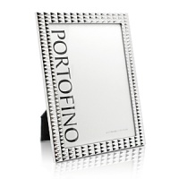 Detailed with a bold studded pattern in gleaming plated silver, this unique frame from Argento brings fashion-forward style to favorite photographs. Detailed with a bold studded pattern in gleaming plated silver, this unique frame from Argento brings fashion-forward style to favorite photographs.