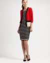 Offering a chic, cropped silhouette and colorblocking, one of this season's hottest trends, a super-fine merino wool sweater with unmistakable charm.V-neckThree-quarter sleevesButton frontRibbed trimAbout 23 from shoulder to hemMerino woolDry cleanImported  Model shown is 5'10½ (179cm) wearing US size Small. 
