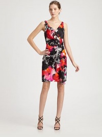 An asymmetrical front ruffle dresses up this abstractly printed silk style.V necklineSleevelessAsymmetrical ruffled drapeV back with concealed zipFully linedAbout 18 from natural waistSilkDry cleanImportedModel shown is 5'10½ (179cm) wearing US size 4. An asymmetrical front ruffle dresses up this abstractly printed silk style.V necklineSleevelessAsymmetrical ruffled drapeV back with concealed zipFully linedAbout 18 from natural waistSilkDry cleanImportedModel shown is 5'10½ (179cm) wearing US size 4.
