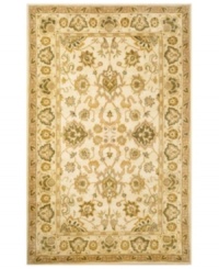 Drawing inspiration from the sandy ruins of ancient Petra and the traditional designs of India, this elegant, hand-tufted rug presents a rich decorative history set against a subtle ivory backdrop and accented with multiple gold and green tones. Drawing inspiration from the sandy ruins of ancient Petra and the traditional designs of India, this elegant, hand-tufted rug presents a rich decorative history set against a subtle ivory backdrop and accented with multiple gold and green tones.