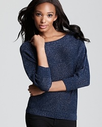 Bring sparkle to your daily looks with this Aqua sweater in a metallic knit. Bring sparkle to your daily looks with this Aqua sweater in a metallic knit.