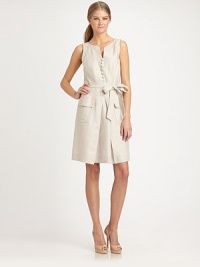 Crisp linen poplin in an easy sleeveless shift styled with tonal buttons and oversized flap pockets.Split V necklineSleevelessSelf-beltInverted front pleatSide zipperAbout 23 from natural waist56% tencel/44% cottonDry cleanMade in USA of imported fabricModel shown is 5'11 (180cm) wearing US size 4. Crisp linen poplin in an easy sleeveless shift styled with tonal buttons and oversized flap pockets.Split V necklineSleevelessSelf-beltInverted front pleatSide zipperAbout 23 from natural waist56% tencel/44% cottonDry cleanMade in USA of imported fabricModel shown is 5'11 (180cm) wearing US size 4.