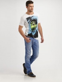 Intensely vibrant graphic accents this cotton essential.V-neckCottonMachine washImported Intensely vibrant graphic accents this cotton essential.V-neckCottonMachine washImported