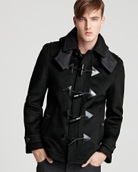 A nostalgic design that recalls fond schoolboy days of lore, this handsome toggle coat offers its wearer the ultimate in classic refinement. A nostalgic design that recalls fond schoolboy days of lore, this handsome toggle coat offers its wearer the ultimate in classic refinement.
