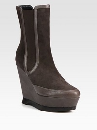 Pebble-grain leather and suede combine in this elevated wedge silhouette with elastic gores for a comfortable fit. Leather-covered and stacked heel, 5 (125mm)Leather-covered and stacked platform, 1¾ (45mm)Compares to a 3¼ heel (80mm)Leather and suede upper with elastic goresPull-on styleLeather liningRubber solePadded insoleMade in Italy Pebble-grain leather and suede combine in this elevated wedge silhouette with elastic gores for a comfortable fit. Leather-covered and stacked heel, 5 (125mm)Leather-covered and stacked platform, 1¾ (45mm)Compares to a 3¼ heel (80mm)Leather and suede upper with elastic goresPull-on styleLeather liningRubber solePadded insoleMade in Italy