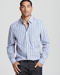 Relaxed enough for the weekend, refined enough for the work week, this classic-fitting button-down from Elie Tahari promises versatility and a big dose of effortless style. Relaxed enough for the weekend, refined enough for the work week, this classic-fitting button-down from Elie Tahari promises versatility and a big dose of effortless style.