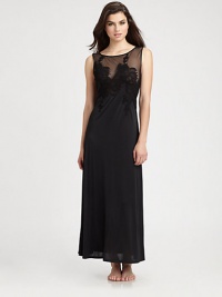 Lightweight mesh appliqué combines with soft-stretch feminine lace in this romantic silhouette. Jewel necklineSleevelessSheer yokeFloral lace overlaySheer backAbout 52 from shoulder to hemNylon/spandexMachine washImported Lightweight mesh appliqué combines with soft-stretch feminine lace in this romantic silhouette. Jewel necklineSleevelessSheer yokeFloral lace overlaySheer backAbout 52 from shoulder to hemNylon/spandexMachine washImported