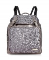 Shine a light on your next excursion with this shimmery, sequin-embellished backpack from Nine West. Roomy interior is aligned with plenty of pockets and compartments to easily stow all of your must-haves and can't-do-withouts.