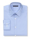 Solid dress shirt with spread collar, two button mitered cuffs. Contemporary fit through the body.