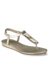 Detailed in snake embossed patent, these luxe-meets-low-key Cole Haan sandals blend comfort with high style.