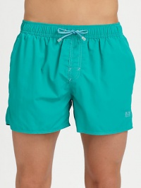 An essential for the sun-loving man, shaped in quick-drying nylon for endless summer fun this season and beyond.Elastic drawstring waistSide slash, back flap pocketInseam, about 4PolyamideMachine washImported An essential for the sun-loving man, shaped in quick-drying nylon for endless summer fun this season and beyond.Elastic drawstring waistSide slash, back flap pocketInseam, about 4PolyamideMachine washImported