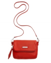 Crafted from soft pebble leather, this Calvin Klein crossbody is the perfect on-the-go style. Throw on this sleek style for a chic look you'll use all year round. Crafted from soft pebble leather, this Calvin Klein crossbody is the perfect on-the-go style. Throw on this sleek style for a chic look you'll use all year round.