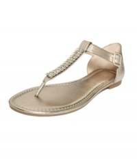 Shimmer and shine. Neat rows of rhinestones add bling to the metallic Marnie flat sandals by INC International Concepts Shoes. Shimmer and shine. Neat rows of rhinestones add bling to the metallic Marnie flat sandals by INC International Concepts Shoes.