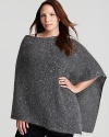 Flecked with sparkling sequins, Eileen Fisher Plus' plush mohair poncho lends an effortless layer, perfectly placed over jeans.