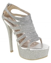 Mega platform. Mega shine. Chinese Laundry's Tea Party platform sandals will have you shimmering and shining with each towering step you take. Mega platform. Mega shine. Chinese Laundry's Tea Party platform sandals will have you shimmering and shining with each towering step you take.