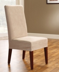 Renew your dining room chair with luxury and style. Featuring the soft look and feel of suede combined with the durability and ease of care you can expect from Sure Fit, with a short skirt that allows the beauty of the chair legs to show. Renew your dining room chair with luxury and style. Featuring the soft look and feel of suede combined with the durability and ease of care you can expect from Sure Fit, with a short skirt that allows the beauty of the chair legs to show.