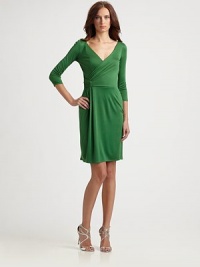 Soft, fluid silk jersey, tailored with ruched details in a flattering, faux-wrap silhouette.Surplice necklineThree-quarter sleevesRuched side detailSide skirt drapeAbout 22 from natural waistSilkDry cleanImportedModel shown is 5'10 (177cm) wearing US size 4. Soft, fluid silk jersey, tailored with ruched details in a flattering, faux-wrap silhouette.Surplice necklineThree-quarter sleevesRuched side detailSide skirt drapeAbout 22 from natural waistSilkDry cleanImportedModel shown is 5'10 (177cm) wearing US size 4.