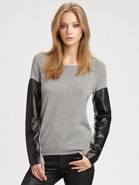 Glossy, leather-trim sleeves and dropped shoulders enliven this cotton and cashmere boatneck. BoatneckDropped shouldersLong, leather-trim sleeves75% cotton/25% cashmere with leather trimDry clean with leather specialistImportedModel shown is 5'9½ (176cm) wearing US size Small.This style runs true to size. We recommend ordering your usual size for a standard fit. Glossy, leather-trim sleeves and dropped shoulders enliven this cotton and cashmere boatneck. BoatneckDropped shouldersLong, leather-trim sleeves75% cotton/25% cashmere with leather trimDry clean with leather specialistImportedModel shown is 5'9½ (176cm) wearing US size Small.This style runs true to size. We recommend ordering your usual size for a standard fit.