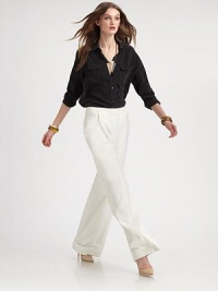 EXCLUSIVELY AT SAKS. An easy wide-leg silhouette tailored with crisp front pleats and a cuffed bottom, all in lightweight twill.Wide button-front waistbandPleated frontCuffed bottomBack welt pocketsConcealed side zipperInseam, about 3370% polyester/30% rayonDry cleanImportedModel shown is 5'10 (177cm) wearing US size 4.ABOUT THE DESIGNER Former fourth-grade schoolteacher Kara Laricks always told her students to be true to themselves. EXCLUSIVELY AT SAKS. An easy wide-leg silhouette tailored with crisp front pleats and a cuffed bottom, all in lightweight twill.Wide button-front waistbandPleated frontCuffed bottomBack welt pocketsConcealed side zipperInseam, about 3370% polyester/30% rayonDry cleanImportedModel shown is 5'10 (177cm) wearing US size 4.ABOUT THE DESIGNER Former fourth-grade schoolteacher Kara Laricks always told her students to be true to themselves.