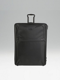 An extra-large, extra versatile expandable wheeled packing case with a bonus Just in Case tote to carry home travel acquisitions. Main compartment with pop-up expansion Removable garment sleeve Two exterior zip accessories pockets Two inside accessories pockets plus tie pocket Top, side and bottom carry handles Telescoping handle Protective feet Tumi Tracer Protection Ballistic nylon Imported 21W X 28H X 11D (13½D expanded) An extra-large, extra versatile expandable wheeled packing case with a bonus Just in Case tote to carry home travel acquisitions. Main compartment with pop-up expansion Removable garment sleeve Two exterior zip accessories pockets Two inside accessories pockets plus tie pocket Top, side and bottom carry handles Telescoping handle Protective feet Tumi Tracer Protection Ballistic nylon Imported 21W X 28H X 11D (13½D expanded)