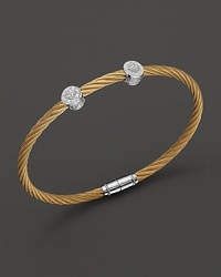 From the Classique Collection, a stackable bangle in white gold and yellow PVD cable with diamond stations. Designed by Charriol. From the Classique Collection, a stackable bangle in white gold and yellow PVD cable with diamond stations. Designed by Charriol.