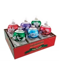 This set of signature flocked ornaments by Christopher Radko is filled with classic Christmas elegance. Each Shiny Brite ball features a unique frosty scene, from skiing snowmen to Santa's sleigh, in shades of green and red. This set of signature flocked ornaments by Christopher Radko is filled with classic Christmas elegance. Each Shiny Brite ball features a unique frosty scene, from skiing snowmen to Santa's sleigh, in shades of green and red.