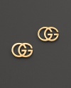 18K yellow gold earrings by Gucci.
