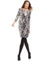 Calvin Klein's printed dress makes office dressing effortless. Pair with tights and pumps for seasonal style perfected.