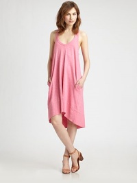 Lightweight racerback dress of pure cotton has a plunging v-neck, asymmetrical hi-low hem and unexpected slash pockets. Plunging v-neckSleevelessSlash pocketsAsymmetrical hi-low hemModified racerbackAbout 26 from natural waistCottonMachine washMade in USAModel shown is 5'10 (177cm) wearing US size Small. Lightweight racerback dress of pure cotton has a plunging v-neck, asymmetrical hi-low hem and unexpected slash pockets. Plunging v-neckSleevelessSlash pocketsAsymmetrical hi-low hemModified racerbackAbout 26 from natural waistCottonMachine washMade in USAModel shown is 5'10 (177cm) wearing US size Small.